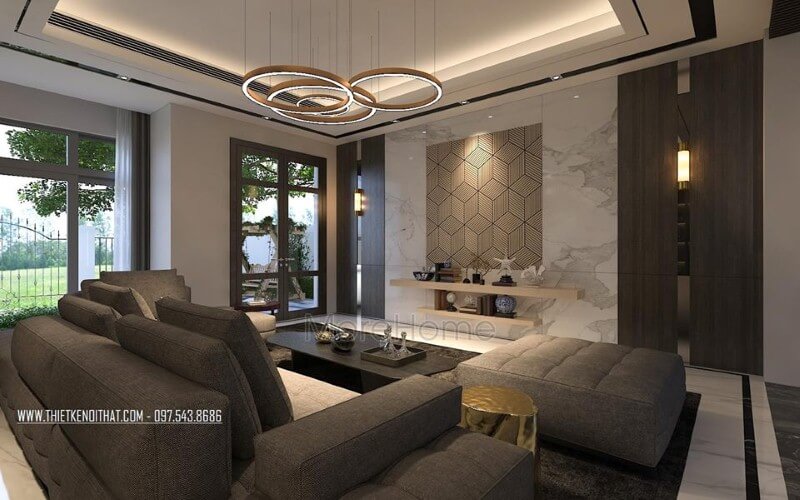 Sắp xếp không gian phòng khách rộng, hiện đại ấn tượng với ý tưởng sử dụng gam màu đối lập từ xám trắng cùng đồ nội thất cao cấp. thiết kế biệt thự